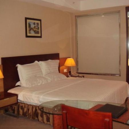 סוג'ואו Neighbourhood Holiday Hotel Suzhou חדר תמונה